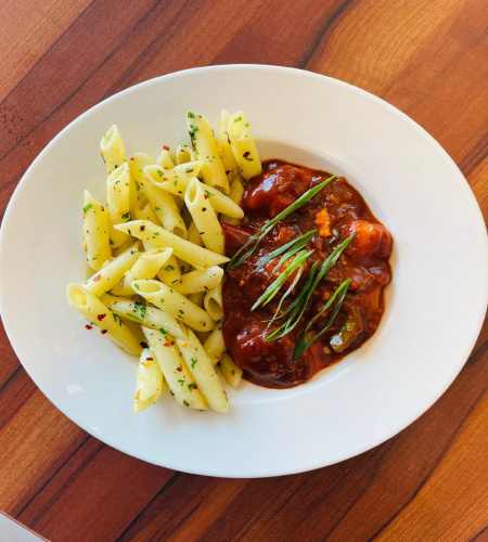 Hot garlic sauce paneer with Penne pasta